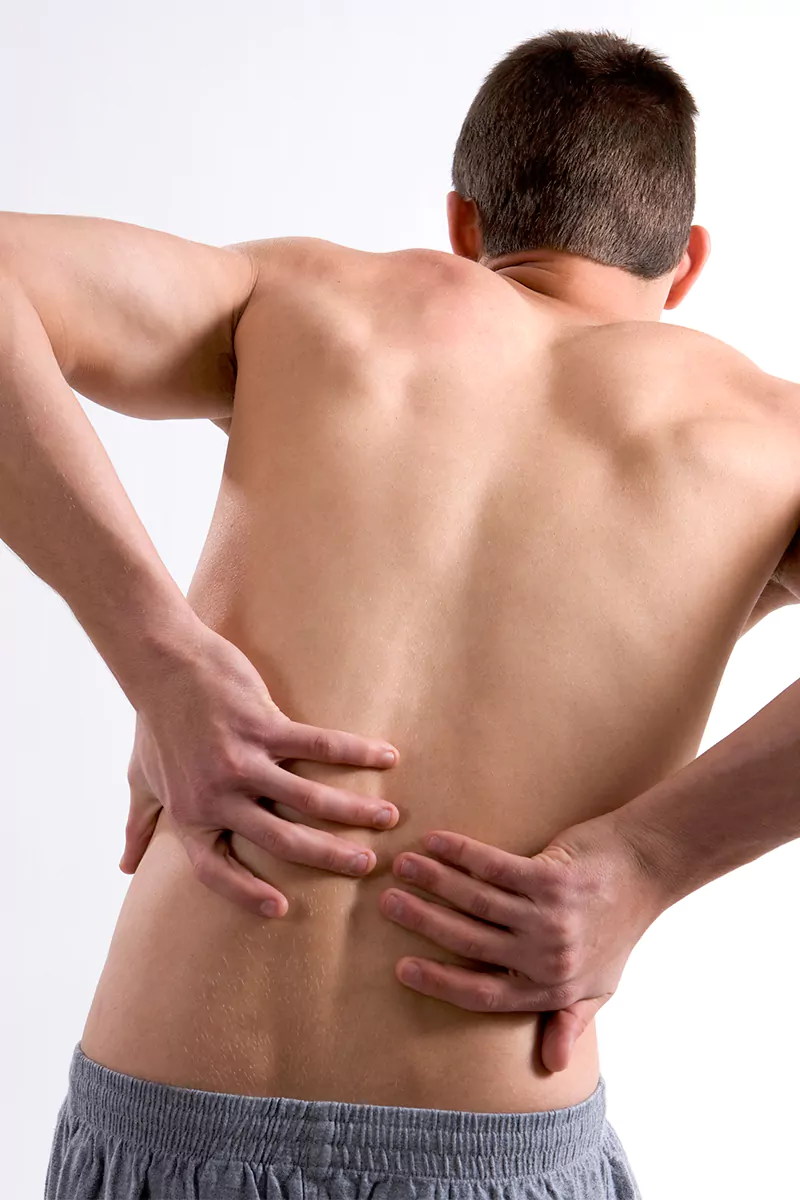 man suffering back pain